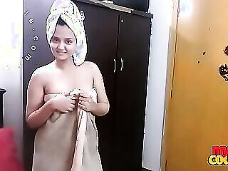 Indian housewife undresses sensually in kitchen